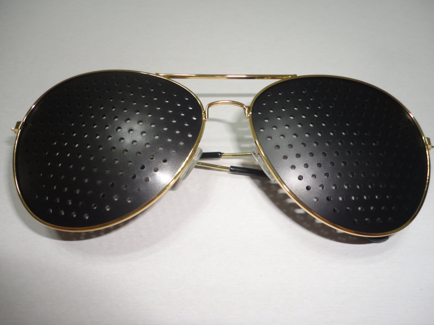 Lentes Estenopeicos Dorados