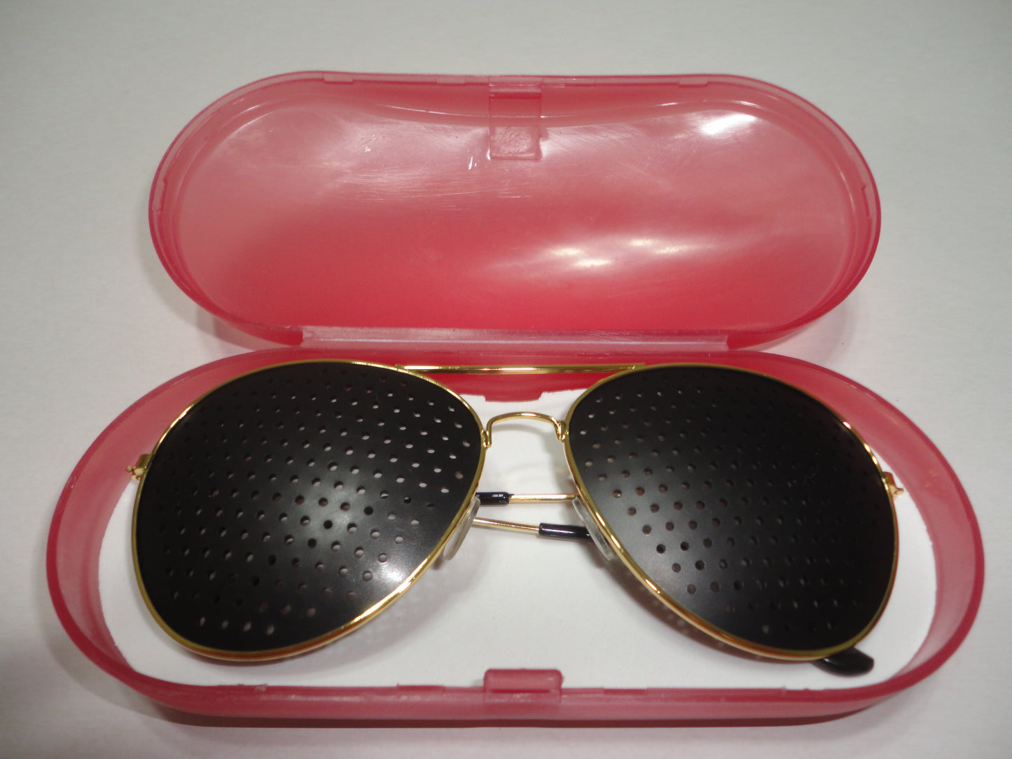 Lentes Estenopeicos Dorados